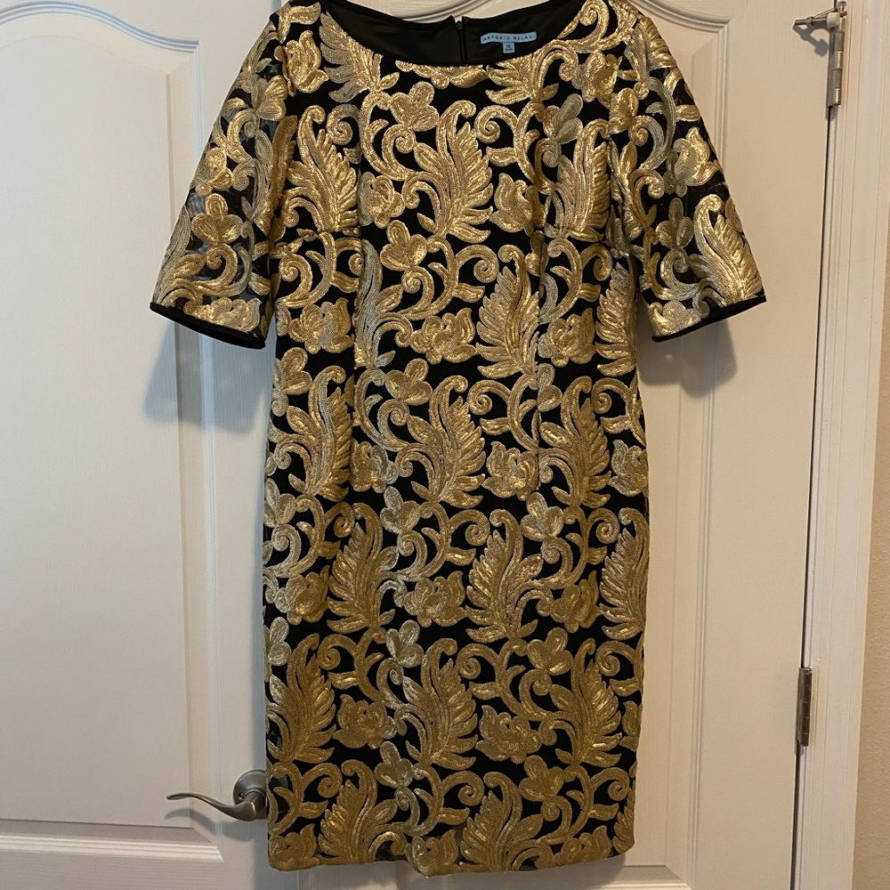 Black and gold sequin dress